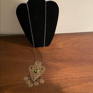Elegant Gold Intricate Pendant Necklace